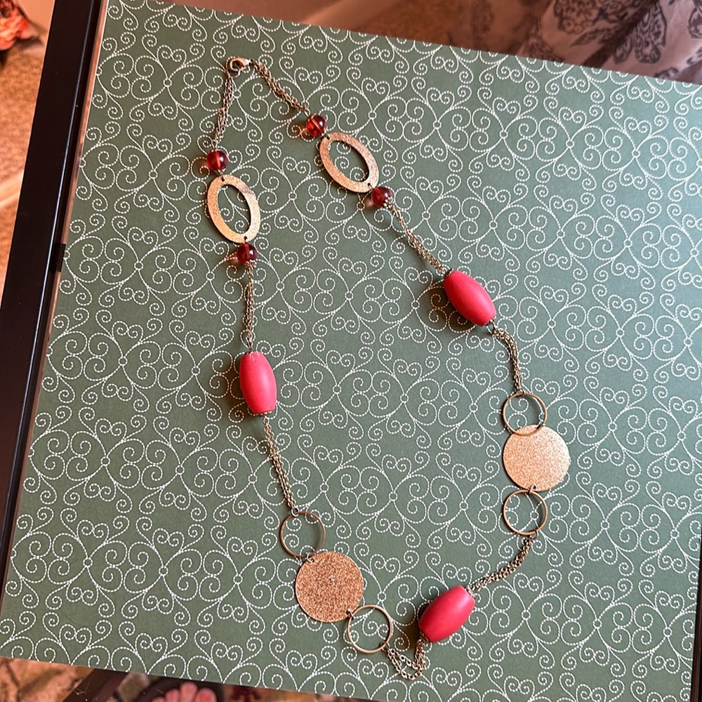 Long gold tone beaded necklace